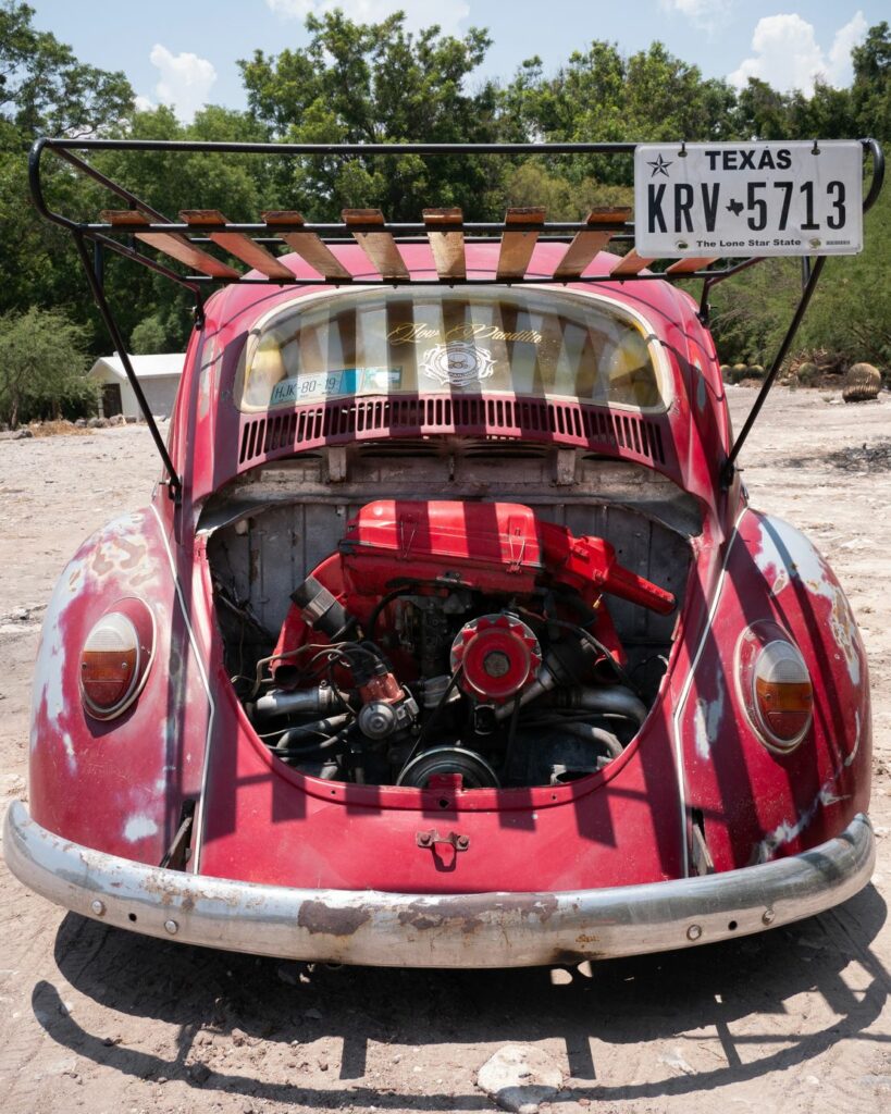 A Texas Beetle proudly presents its rear, air cooled engine, a staple of the Beetle's design. Mirja Vogel