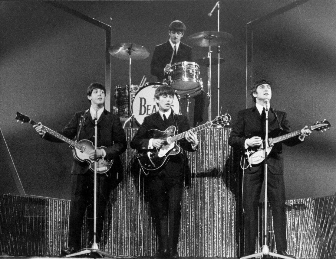 The Beatles, here playing at the London Palladium, shaped the musical tastes of youth in the 1960s, and for many pop music fans, the group's artistry has not been surpassed.